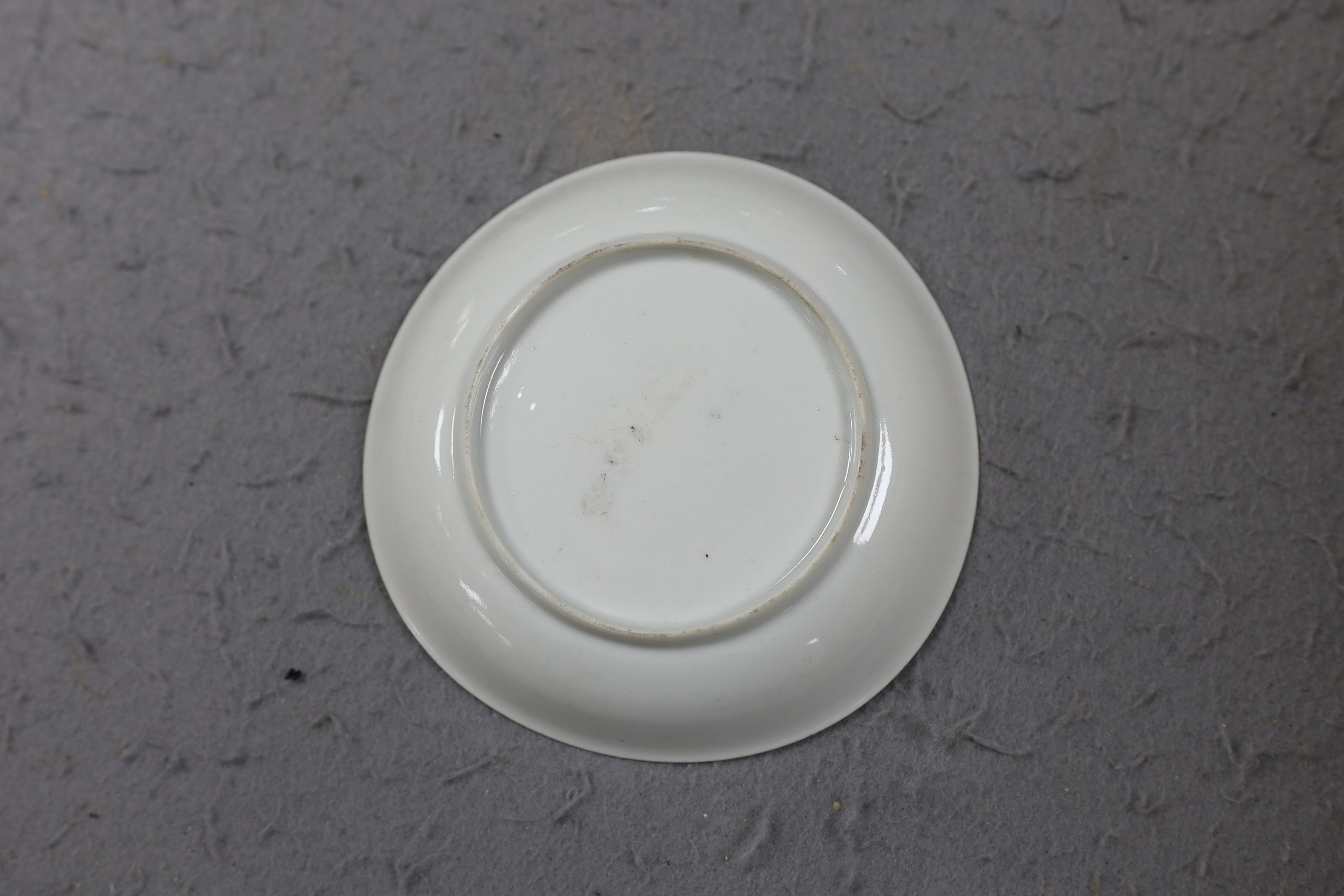 A group of four 18th century Chinese export famille rose saucers